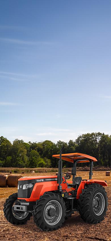 TAFE-6515-4WD-Orange-Tractor-Rural-Farming-Clear-Sky.png