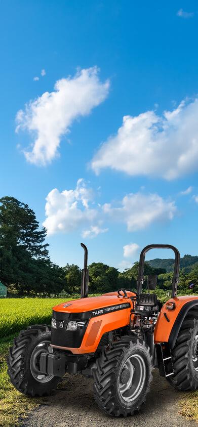 Tractor-8515-TAFE-Tractor-Rural-Landscape-GreenTrees.png